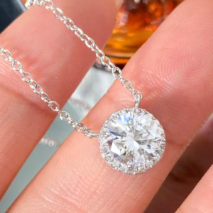 Sterling Silver Halo Pendant with Brilliant Round Center Stone & CZ Accents - Elegant Women's Jewelry